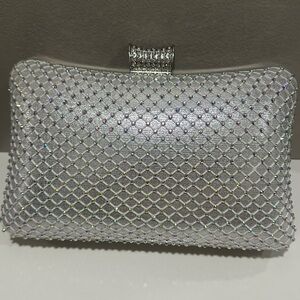 Glamorous Silver Clutch with Crystal Clasp and Mesh Design
